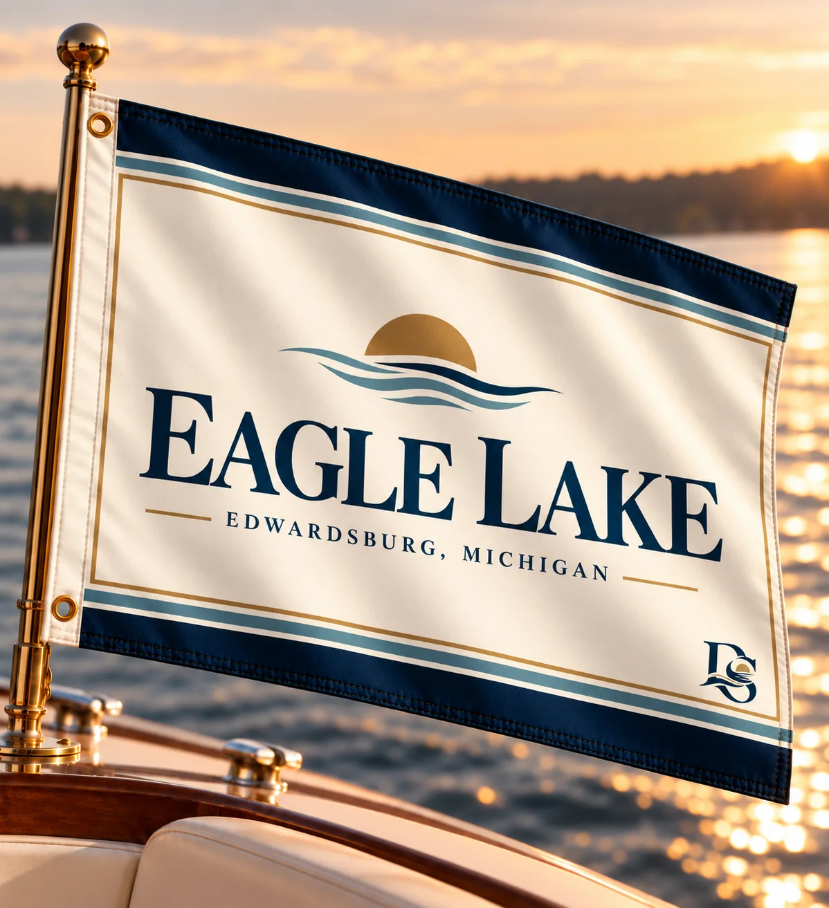 Eagle Lake beach flag: horizon sun over waves, navy and lake-blue stripes, DS monogram